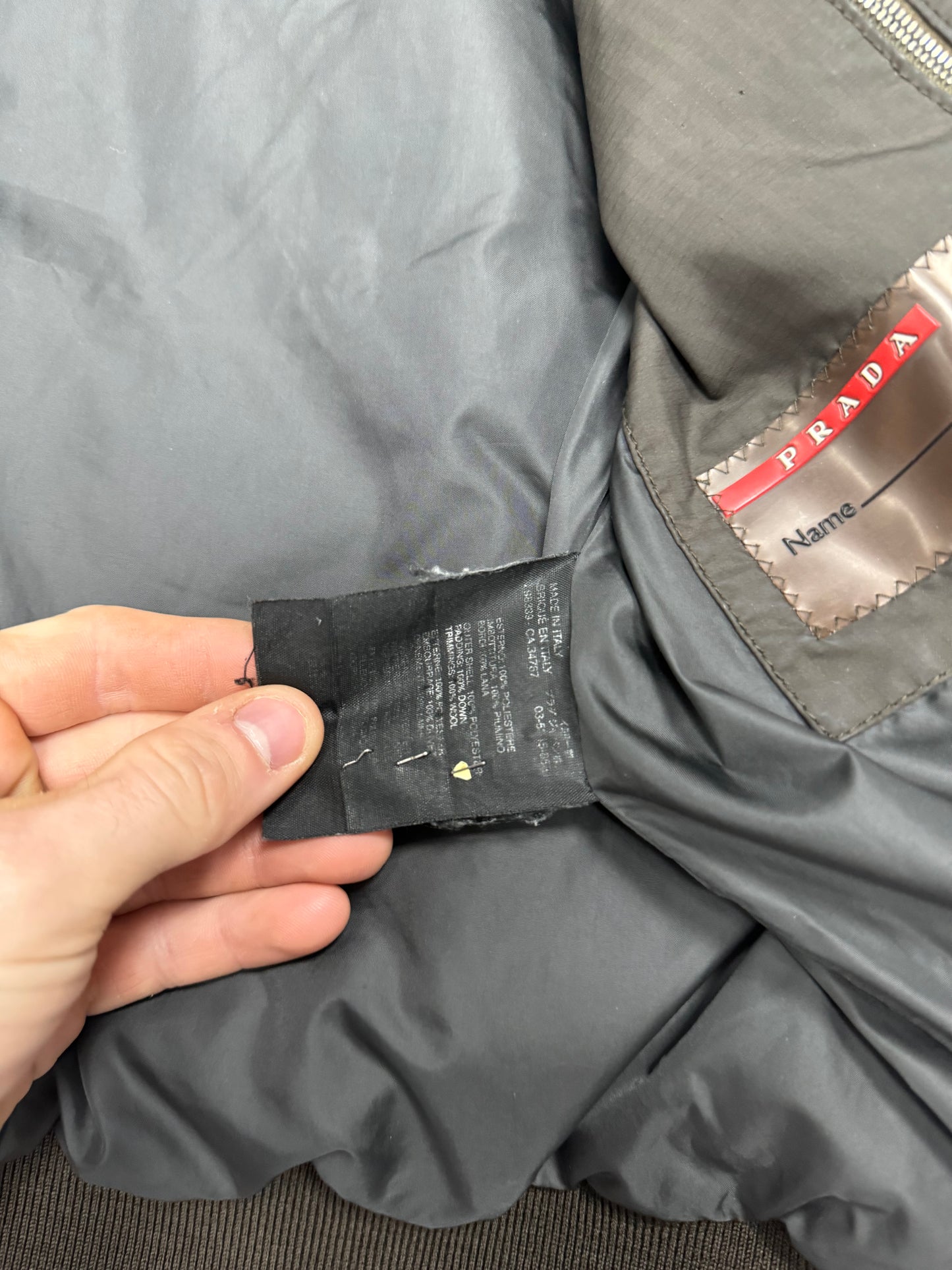 Prada sport puffer jacket (M)