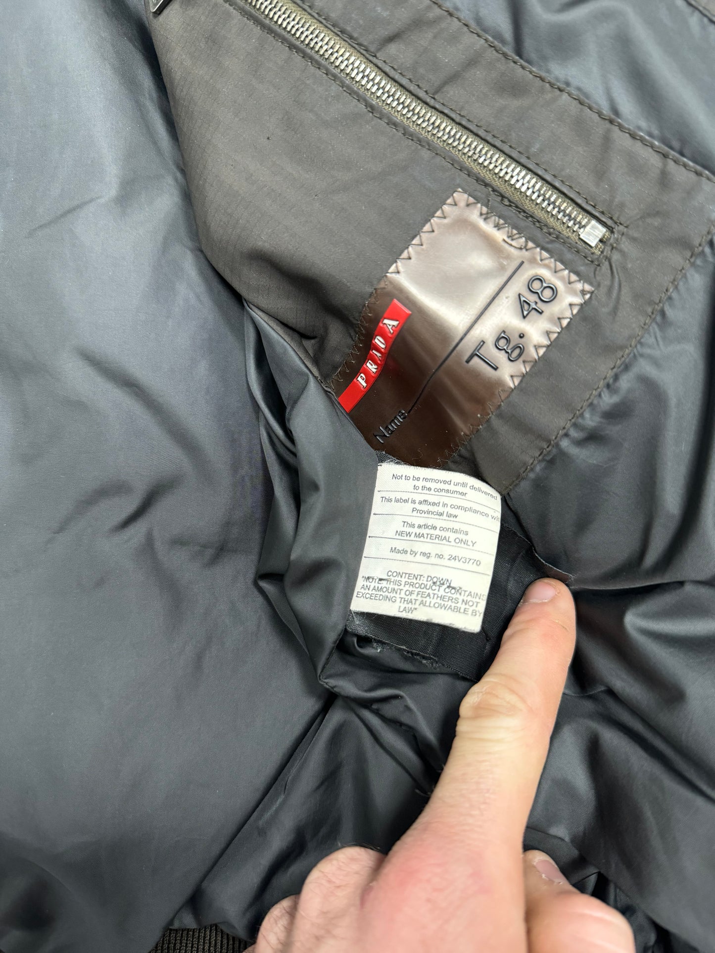 Prada sport puffer jacket (M)